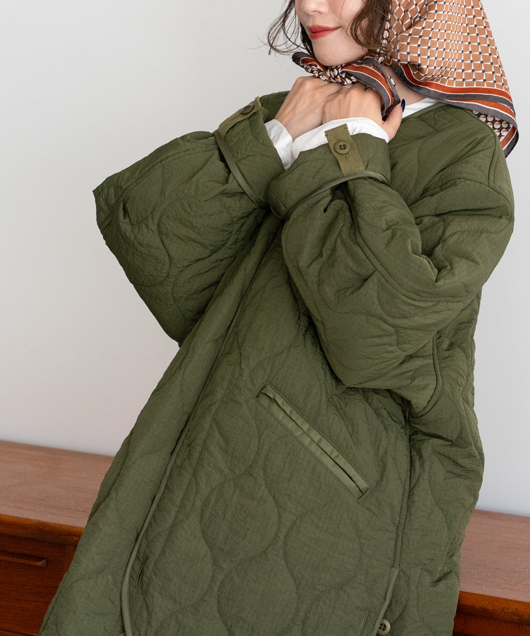 ASYMMETRY QUILTED COAT