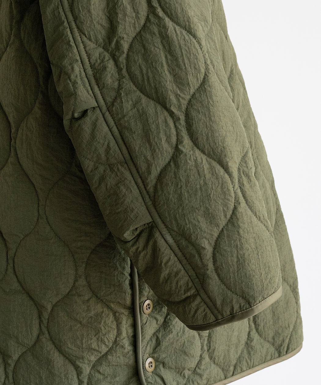 ASYMMETRY QUILTED COAT